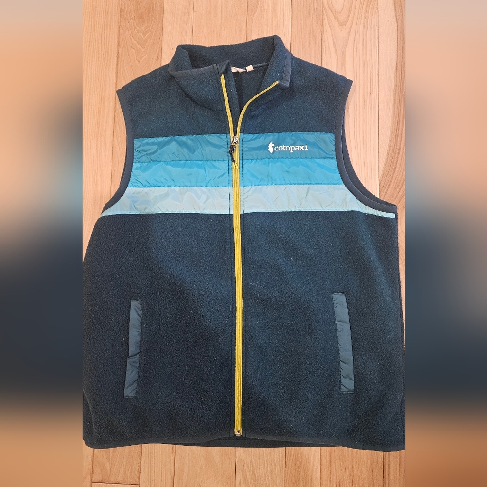 Cotopaxi Fleece Vest with Blue Stripes and Yellow Zipper